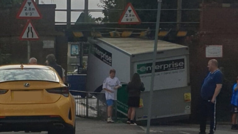 Van collides with low railway bridge closing Lake Road in Poole