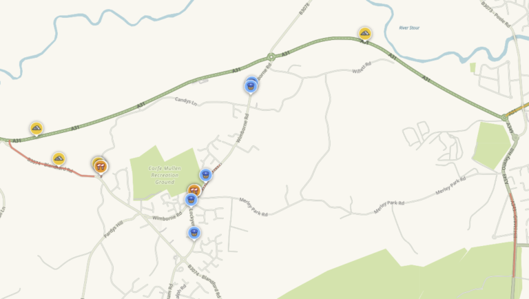 Wimborne Road blocked due to a collision between a car and a motorcycle in Corfe Mullen
