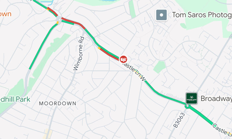 Castle Lane West partially blocked both ways due to a collision in Bournemouth