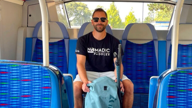 Paddle board adventurer explores Dorset coastline entirely by bus