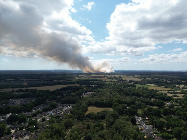 Major incident declared following large fire at Holt Heath