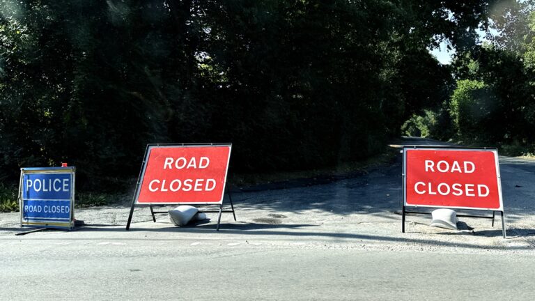 Holt Heath roads remain closed as wildfire crews continue work