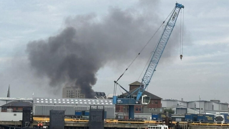 Dozens of firefighters tackle Poole warehouse fire
