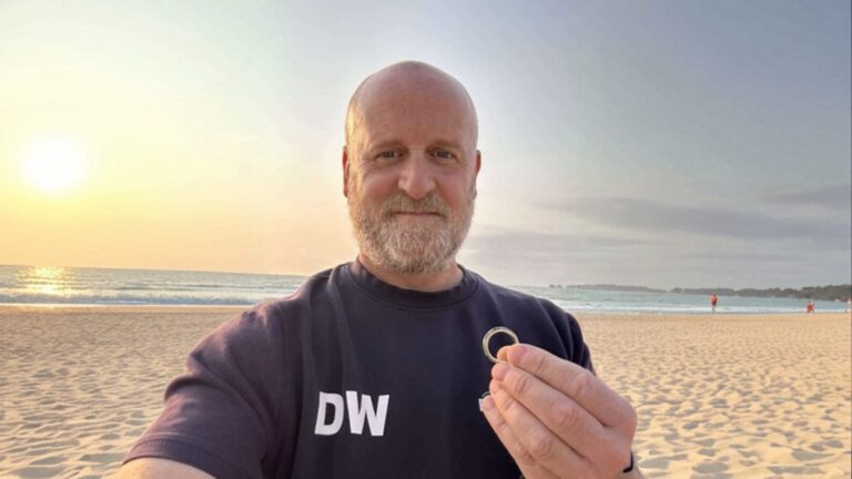 Metal detector man offers free service
