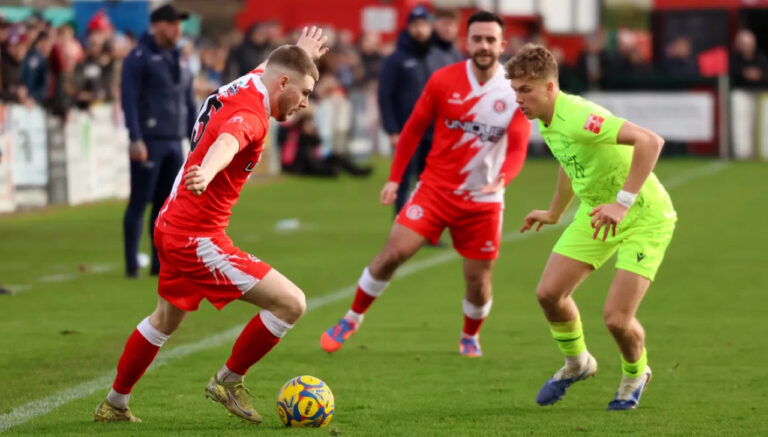 Poole Town stay in promotion hunt after 3–1 win